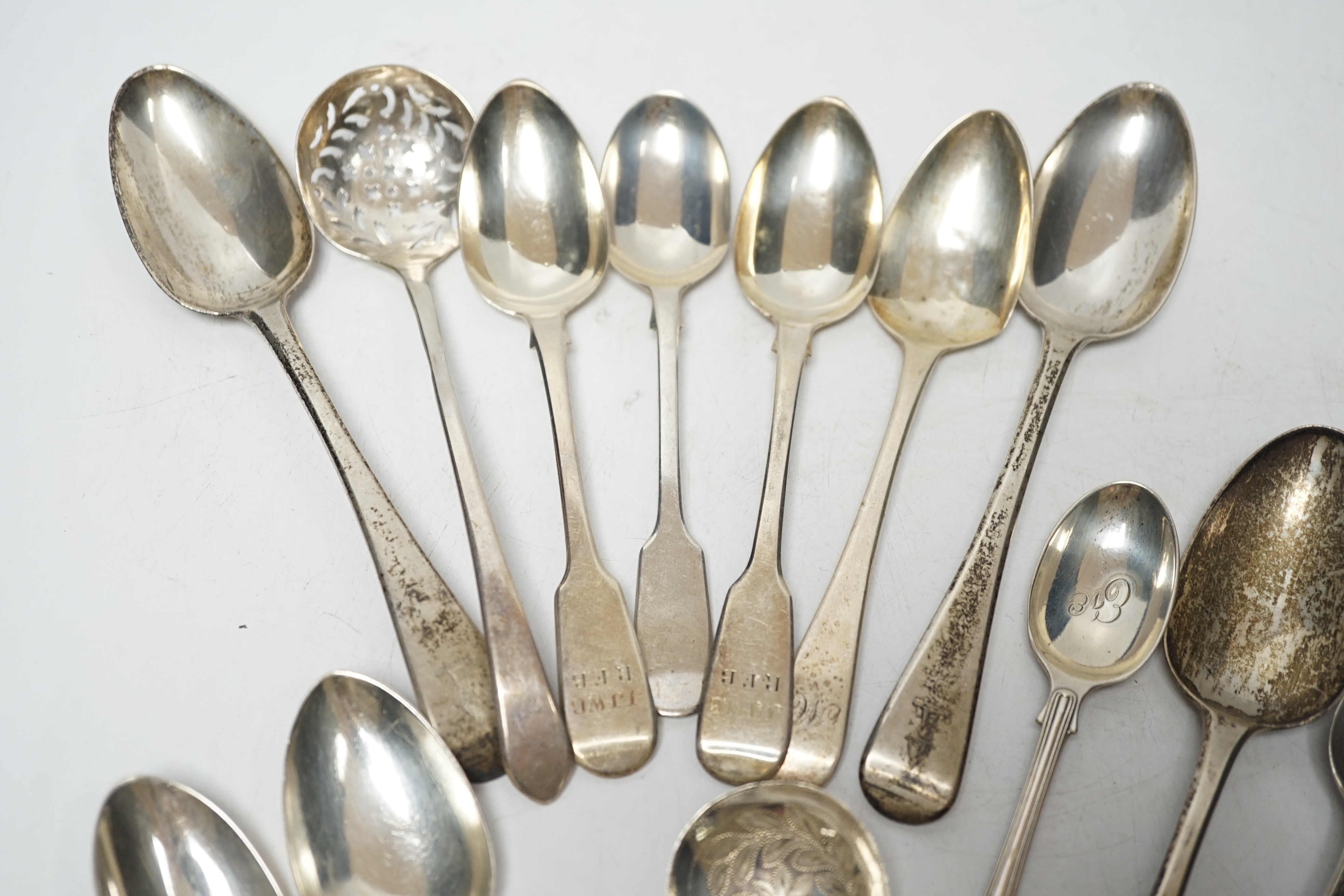 A quantity of assorted 18th century and later flatware, mainly teaspoons including a set of six base mark teaspoons, caddy spoon, etc, 32.7oz and eight plated spoons.